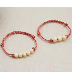 Vòng tay ngũ sắc nút kéo dây đỏ phối 1 hạt dâu trắng | freesize người lớn | Chồi Nhỏ